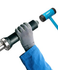 TMFT 36 Bearing Fitting Tool Kit For Mounting Bearings With Bore Diameters From 10 To 55 Mm Includes 36 Impact Rings 3 Impact Sleeves And Dead Blow Hammer In Durable Carry Case Ideal For Workshop Use And Industrial Maintenance Applications being used with gloved hands and hammer.