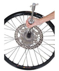 Blind Hole Bearing Puller Kit With Slide Hammer And Collets, 8mm Through 30mm in use on a wheel hub, durable steel construction