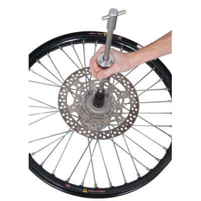 Blind Hole Bearing Puller Kit With Slide Hammer And Collets, 8mm Through 30mm in use on a wheel hub, durable steel construction