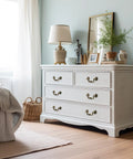 White dresser with Antique Bronze Drawer Pulls Set With Screws Rustic Vintage Drop Handles in a cozy bedroom setup.