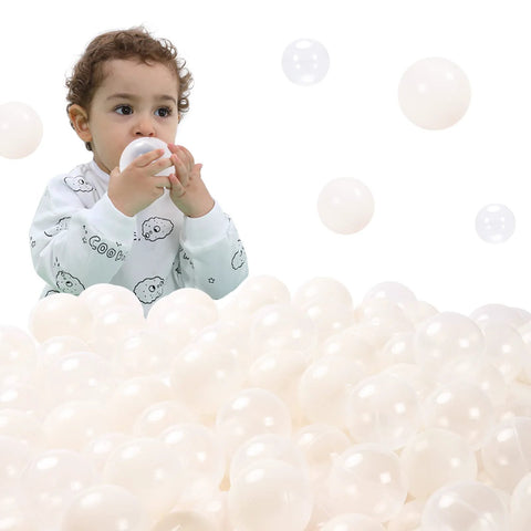 Child playing with 100 Ball Pit Balls Phthalate Free BPA Free Crush Proof Plastic - Beige Colors in Reusable Play Toys for Kids
