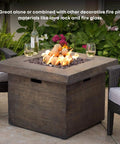 15-Pack Beige Ceramic Balls - 3” Round Fire Stones in fire pit on patio