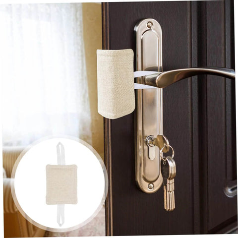 Beige cotton door damper and slam silencer set reduces noise, prevents slams, and protects walls; installed on door handle.