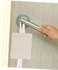Reduce annoying door slams with this 3 pack of door silencers, a simple no drill installation shown on beige cushion attached to handle