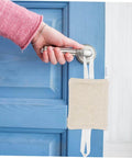 Reduce annoying door slams with this 3 pack of door silencers, a simple no drill installation on a blue door handle, beige cotton cushion.