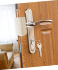 Beige door silencer installed on wood door handle, showcasing experience peaceful rooms with easy, tool-free door silencers.