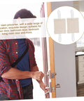 Person installing beige door silencers to experience quiet, safe doors with these tool-free door silencers; simply suspend on the knob.