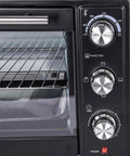 Control panel and interior rack of the Bench Top Powder Coating Oven 1600 Watt 120 Volt With 450 Degree Capacity, showing dials and metal rack.