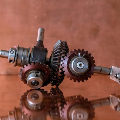 Bevel Gear Set 2pc 0.8 Module 1 To 1 Reduction 15 Teeth Gear 4mm Hole 45 Degree in an assembled machinery view