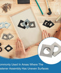Assortment of Beveled Square Washers M10 Stainless Steel Shim Leveling Wedge Washers Silver on a workbench