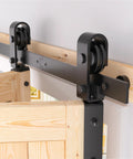 Close-up of 52 Inch Bifold Barn Door Hardware Kit For Two Doors In Black Finish With Thickened Carbon Steel Construction Anti Skipping Design