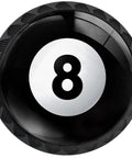 Close-up of a black billiards 8 ball knob from the 4 Pack Billiards 8 Ball Cabinet Knobs Round Drawer Pulls For Kitchen And Bathroom Cabinets Cupboard Doors Hardware Black And White 8 Ball Knob Set For Game Room Decor And Modern Cabinet Styling.