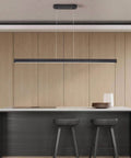 47 Inch Black Linear Pendant Light With Wood Finish Dimmable LED Ceiling Fixture For Dining Room Kitchen Island And Pool Table Remote Control And App Connectivity Modern Industrial Lighting For Home installed over kitchen island