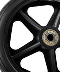 Close-up of a black 6 inch rubber wheelchair wheel with anti-slip ABS hub, part of a 2 Pack 6 Inch Rubber Wheelchair Wheels Replacement.