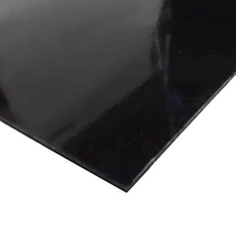 Close-up of ABS Black Plastic Sheet 12 By 18 By One Sixteenth Inch Haircell Front Pattern, Smooth Back, for automotive repairs and DIY projects.
