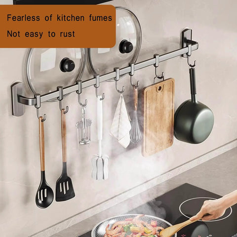 Kitchen Hooks Utensil Holder Wall Utensil Rack with pots, pans, and utensils hanging on a 45cm black aluminum rail above a stovetop.
