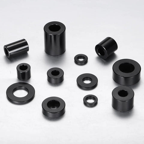 4 Pack Aluminum Spacers M5 Unthreaded Standoff Black Three Sixteenth Inch Inner Diameter One Half Inch Outer Diameter Three Quarter Inch Length For M5 Screws Bolts Durable Metal Spacers arranged on a table