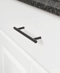 Euro Bar Cabinet Pull Handle Flat Black Finish Three Eighths Inch Diameter Eight Point Six Nine Inch Length Center To Center Six Point Three One Inch With Mounting Hardware Included Ten Pack installed on white drawer