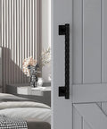 12 Inch Sliding Barn Door Handle Pull In Black Finish installed on interior sliding door