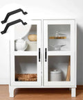 2 Pack Black Barn Door Handle 6.1 Inch Door Pull Handle for cabinet with a display of two handles and white cupboard with items inside.