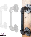 1/2 In X 6 In Matte Black Pipe Sliding Barn Door Handle For Indoor And Outdoor Use attached to wooden door