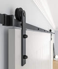 10 Foot Barn Door Hardware Kit For Single Sliding Door Heavy Duty Black Carbon Steel Track And J Shape Rail Includes All Necessary Hardware For Quick Smooth Installation For A 65 Inch Closet Panel No Door installed side view