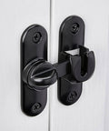 Black Barn Door Latches,90/180 Degree Gate Lock on white door, Flip Gate Latches Hardware, Zinc Alloy Right Angle Door Lock Latch installed view