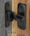 Installed 90/180 Degree Flip Barn Door Lock in black on wood with screws, providing security for barn or interior doors.