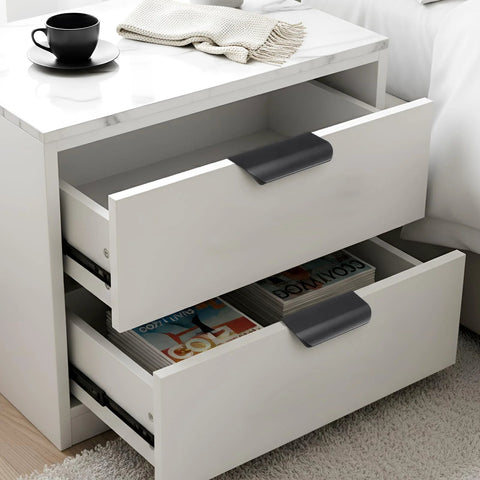 White dresser with open drawers showing 20 Pack Self Adhesive Finger Pulls For Cabinets No Drill Edge Pull Handles, black, easy install.