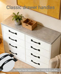 White dresser with Six Pack Five Point Six Inch Cabinet Pulls And Door Handles In Matte Black Stainless Steel
