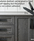 Black Cabinet Pulls 4 Pack for Kitchen Cabinets and Drawers 4.72 Inch Length, shown installed on wooden cabinets