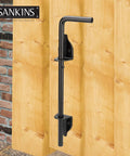 Beefed Up 12 Inch Cane Bolt Drop Rod Gate Hardware Heavy Duty Black Solid Steel Ground Latch for Wood Gates Installed View