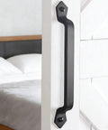 Heavy Duty Cast Iron 11-Inch Barn Door Handle For Sliding Doors installed on a white door, vintage long gate pull, black finish