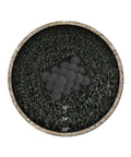 Top view of 3 Inch Ceramic Fire Balls 20-Pack Modern Accessory for Fire Pits on gravel base, Brushed Concrete Look, Midnight Black.