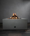 12-Pack Black Ceramic Fire Balls in modern gas fire pit, suitable for indoor and outdoor use with natural gas or propane fires