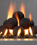 12-Pack Black Ceramic Fire Balls in use with flames, for Fireplace or Fire Pit, suitable for Outdoor & Indoor, Decorative Landscaping, Natural Gas fires.