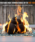 12 Pack Ceramic Balls, Mixed of 4 Size Fireplace Balls burning with flames in an outdoor fire pit, high-temperature black ceramic.
