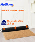 Weighted Door Draft Stopper, 36 Inch Heavy Duty Under Door Blocker With Hook And Loop Fastening, 4.5 Inch Wide Bottom Door Seal For Noise Reduction, Energy Saving, And Spill Prevention, Black blocking a draft under a white door.