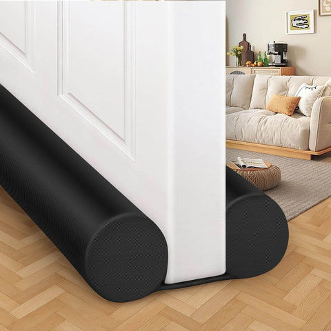 Beefy 36 Inch Door Draft Stopper With 2 Inch Diameter Foam Core Covers 0.5 To 1.7 Inch Gaps Heavy Duty Weather Stripping Adjustable Double Door Sweep Noise Reduction Light Blocker Odor Guard Black installed on a white interior door.