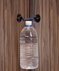 2 Pack 6'' Door Latch Door Lock Hardware, 6'' Hook and Eye Gate Latch shown hanging a water bottle on a wooden surface