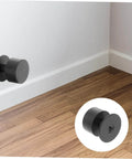 Black Door Silencer Wall Bumper Collision Stopper for Interior Use, shown wall-mounted with easy install hardware for silent door closing.
