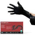Person wearing Black Dragon 6mil Disposable Latex Gloves for Food Processing and Automotive, with packaging visible.