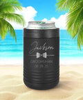 Custom Engraved Stainless Steel Can Cooler For 12 Oz And 16 Oz Cans, Vacuum Insulated With Anti Slip Grip, Keeps Drinks Ice Cold For Hours, Perfect Wedding Party Gift For Groomsmen And Bridesmaids, For The Whole Crew, Black, on a beach setting.