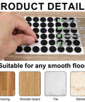 48 Pack Felt Pads for Furniture and Cabinet Doors, 1/2 Inch Black Round Self Adhesive Protectors displayed in hand.