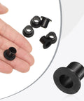 Hand holding flanged nylon sleeve bearings, black, ID 8mm, OD 10.6mm, length 12mm, pack of 24, self-lubricating bushings.