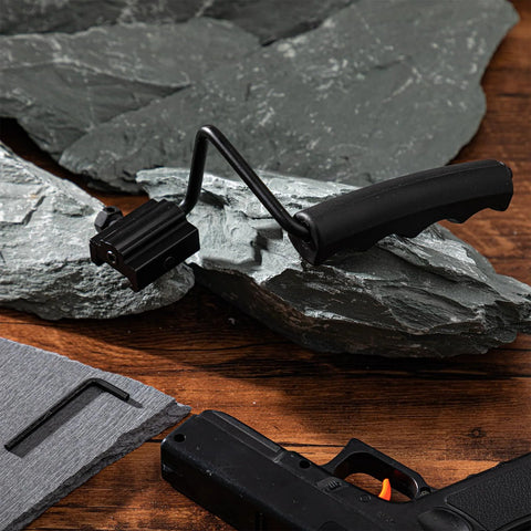 Two Pack Foldable Carry Handles With Non Slip Grip And Aluminum Base, installed on Picatinny rail, 50 lb load capacity, shown on rock surface.