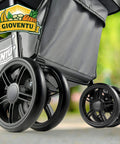 Close-up of the wheels on an upgraded 36 gallon folding shopping cart with wheels for groceries and more, 80lb capacity, 360 degree wheel mobility, removable tote bag, multifunctional portable personal cart for easy grocery hauls, no fuss fold, black.