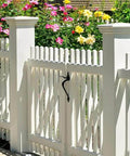 Self Locking Gate Latch Built Tough For Wooden Fences And Gates With 9 Inch Gate Handle Heavy Duty Gate Latch installed on a white garden gate.