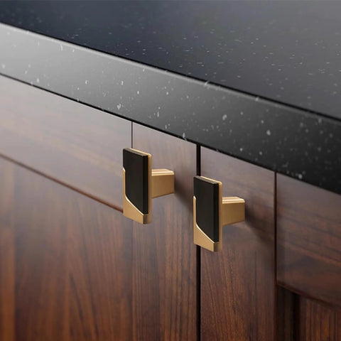 Six Pack Black and Gold Drawer Knobs 1.5 Inch Solid Zinc Cabinet Knobs for Cabinets Dressers and Closets installed on wood cabinet