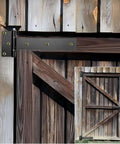 Beefy 12 Inch Heavy Duty T Strap Hinges Set Black Outdoor With 180 Degree Opening installed on wooden gate